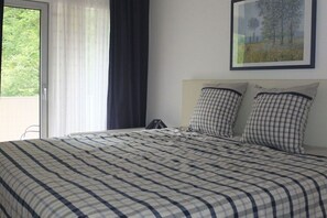 1 quarto, ferros/tábuas de passar roupa