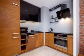 Leilighet, 1 soverom, balkong | Eget kjøkken | Mikrobølgeovn, oppvaskmaskin, vannkoker og kjøkkenutstyr