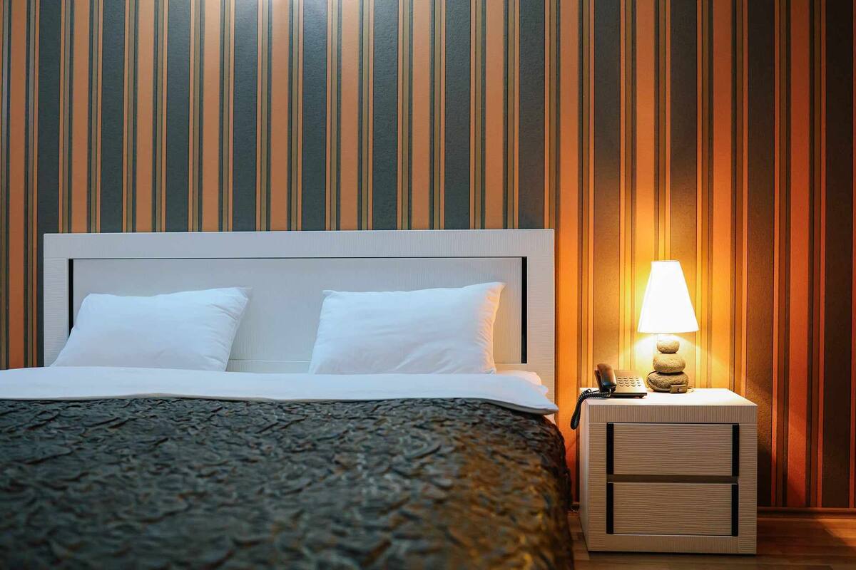 Family Room | Premium bedding, desk, laptop workspace, iron/ironing board (on request)