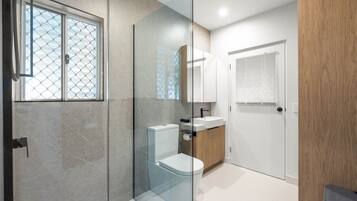 Shower, hair dryer, towels, soap
