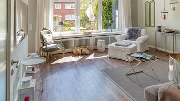 TV, DVD player, ping pong, books