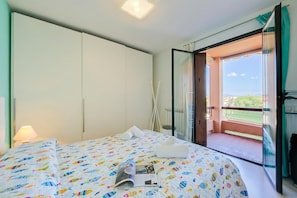 อพาร์ทเมนท์สำหรับครอบครัว, หลายห้องนอน (Green Tiffany Apartment) | 1 ห้องนอน, Wi-Fi ฟรี, ผ้าปูที่นอน