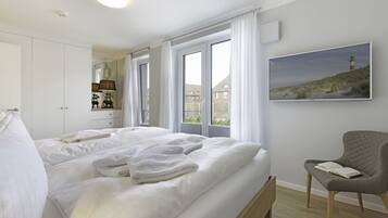 1 slaapkamer, een strijkplank/strijkijzer, gratis wifi, beddengoed