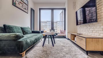 Lägenhet City | Vardagsrum | 37-tums platt-tv med digitalkanaler