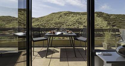 "Urlaub im Dünenloft: Entspannung und Komfort an der Nordsee!"