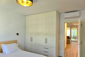 1 habitación, tabla de planchar con plancha, wifi gratis y ropa de cama 