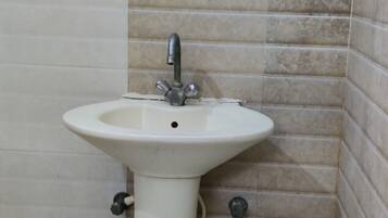 Shower, rainfall showerhead, towels, soap