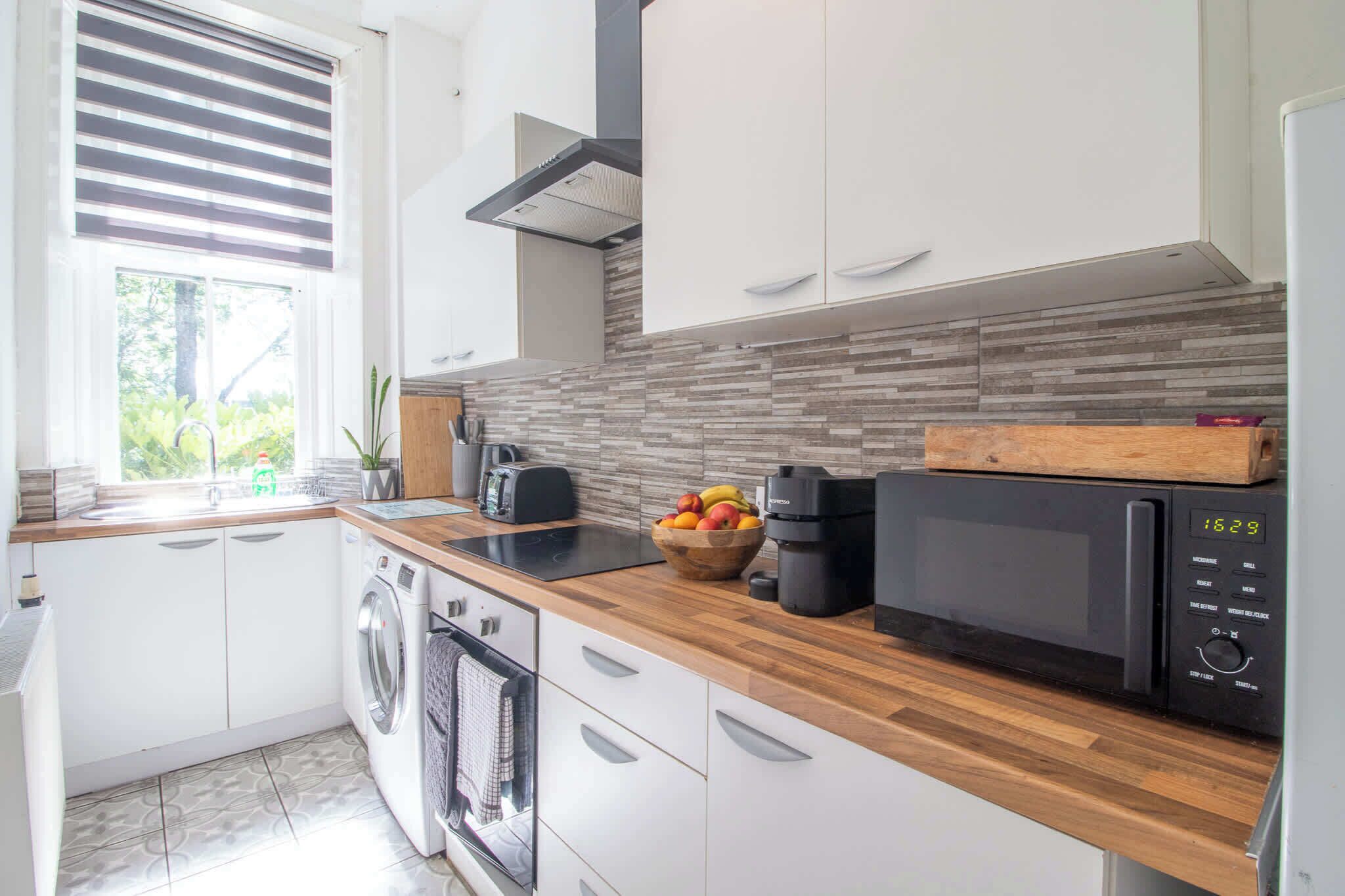 Coffee/tea maker, fridge, microwave, oven