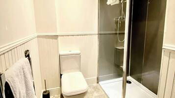 Shower, hair dryer, shampoo