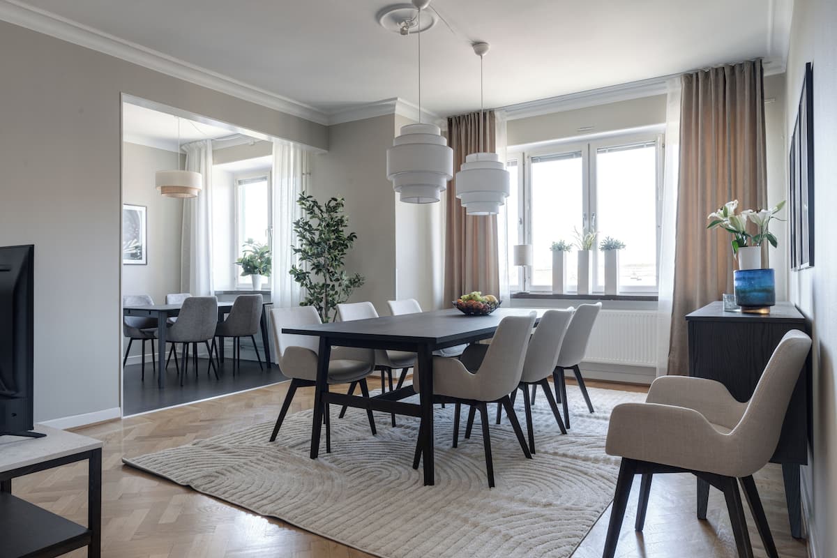 Grand Four-Bedroom Suite | Living area | 60-inch flat-screen TV with cable channels