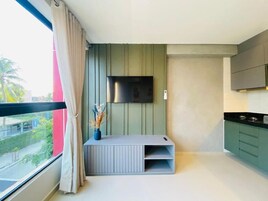 Apartamento luxo, vista para a cidade | 1 quarto, ferros/tábuas de passar roupa, Wi-Fi de cortesia