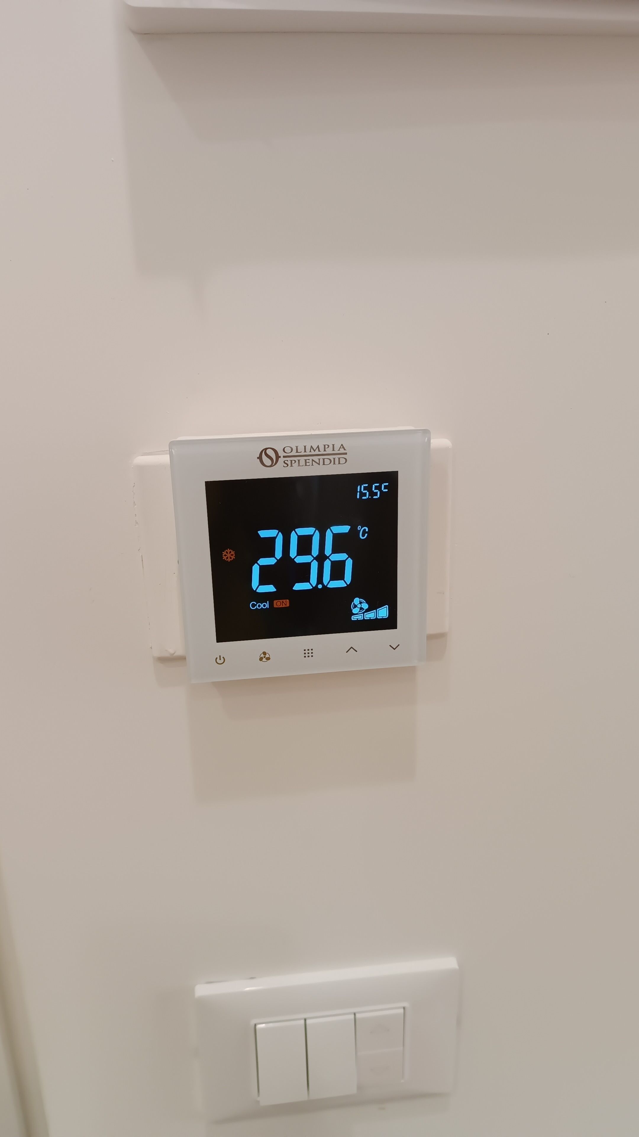 A digital thermostat displaying 29.6°C with 'Cool' and 'ON' indicators.