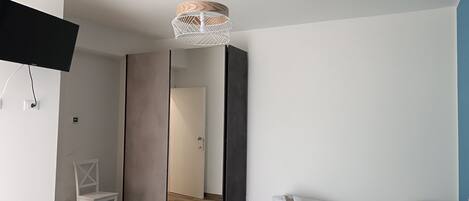 Family Room, Private Bathroom | 1 bedroom, individually furnished, soundproofing, travel cot