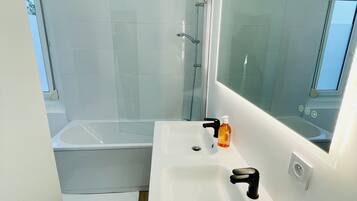 Hair dryer, towels, soap, shampoo