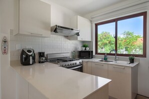 Fridge, microwave, oven, coffee/tea maker