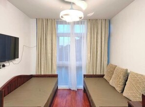 Family Condo | Living area | 42-inch Smart TV with digital channels, Netflix, streaming services - Grandview Residences by Vilma near Burnham Park-204 (Baguio)