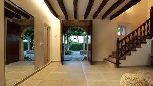 A spacious hallway with a wooden staircase leading to an outdoor area. - H2904 Finca Creva with pool for 10 people in Pollenca (Pollenca)