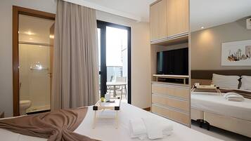 Apartamento | Escrivaninha, Wi-Fi de cortesia, roupa de cama