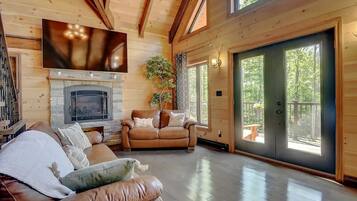 Smart TV, chimenea, futbolito, mesa de ping pong