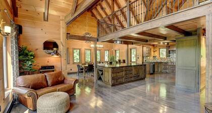 Luxurious chalet featuring a jacuzzi, pool, small lake, sauna and pool table.