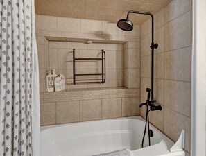 Shower, hair dryer, towels, shampoo