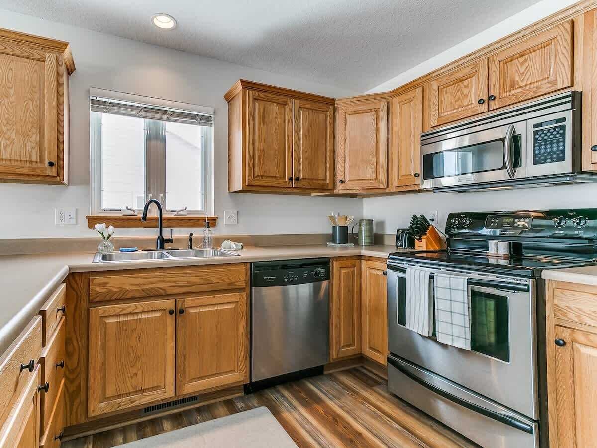 Fridge, coffee/tea maker, cookware/dishes/utensils