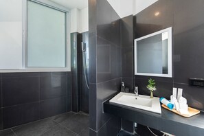 Shower, hair dryer, slippers, towels