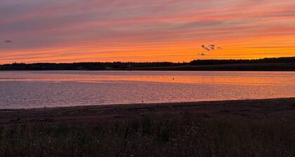Relax overlooking the beautiful New London Bay in our 3 bed, 2 bath cottage