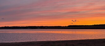 Relax overlooking the beautiful New London Bay in our 3 bed, 2 bath cottage