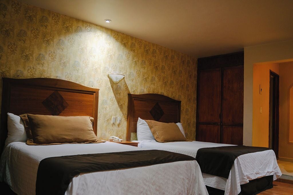 Coffres-forts dans les chambres, Wi-Fi gratuit, draps fournis
