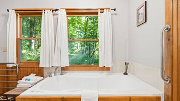 Shower, jetted tub, hair dryer, towels
