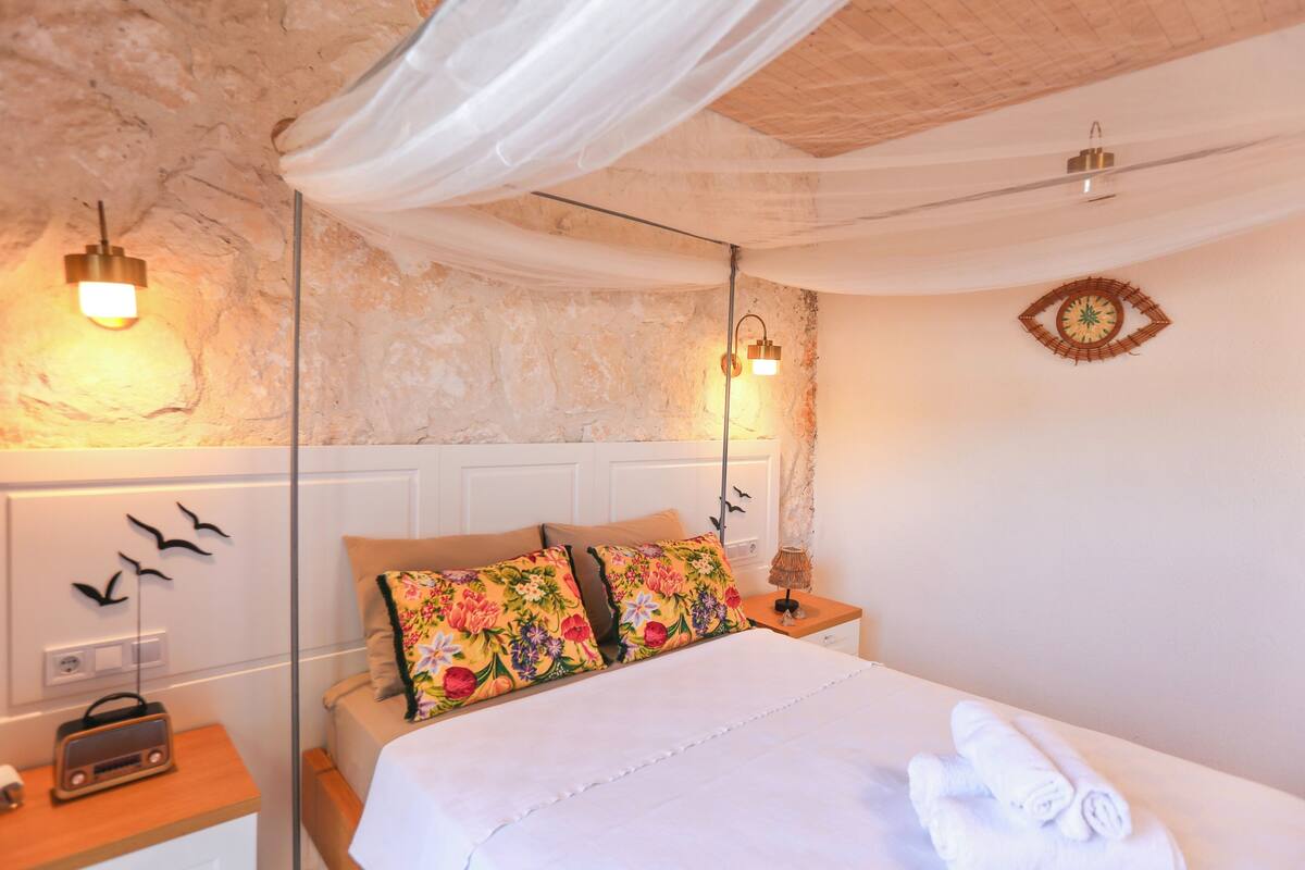 Comfort Room | Premium bedding, desk, laptop workspace, iron/ironing board