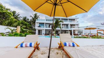 On the beach, white sand