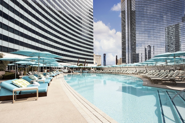 Seasonal outdoor pool, cabanas (surcharge), pool umbrellas