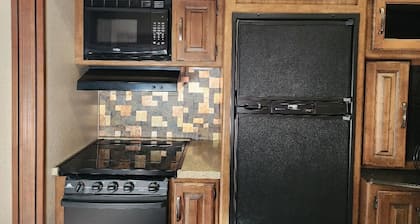 “Home Is Where You Park It”. Our RV Travel Trailer SLEEPS 4 PEACEFULLY. @Masters