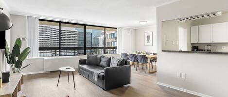 Comfort Apartment, 2 Bedrooms, City View | Living area | 50-inch Smart TV with cable channels