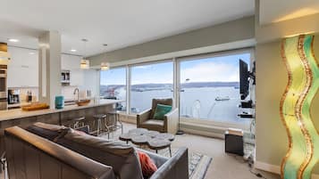 Premium Condo | Living area | 43-inch TV with digital channels