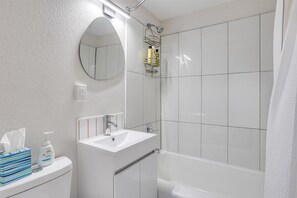 Hair dryer, towels, soap, shampoo