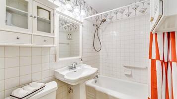 Hair dryer, towels, soap, shampoo