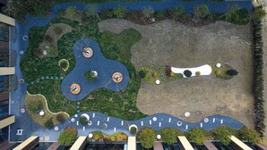 An aerial view of a landscaped rooftop with pathways, water features, and greenery. - Days Inn by Wyndham Yangzhou Guangling (Yangzhou)