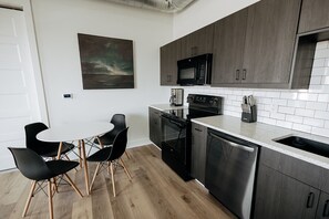 Fridge, microwave, oven, stovetop - Walk To Intrust Bank Arena! Modern Loft W/ W&D! (Wichita)