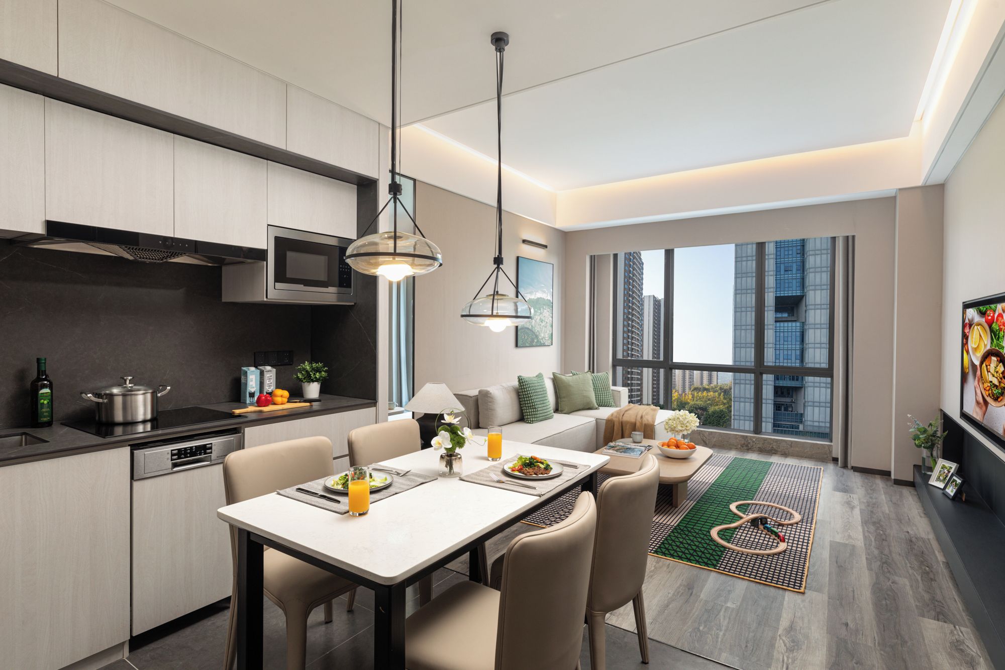 A modern kitchen with a dining area, large windows, and a view of a cityscape.