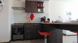 Fridge, microwave, cookware/dishes/utensils