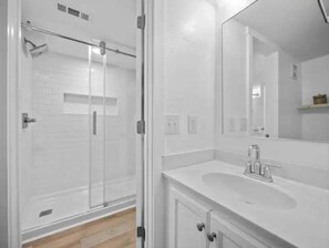 Shower, towels, soap, toilet paper