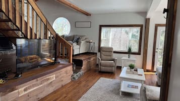 Smart TV, fireplace, DVD player, foosball