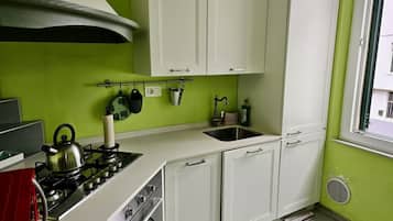 Een koelkast, een oven, een vaatwasser