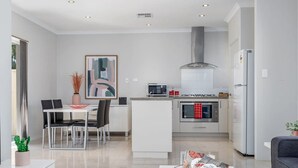 Fridge, stovetop, dishwasher, electric kettle