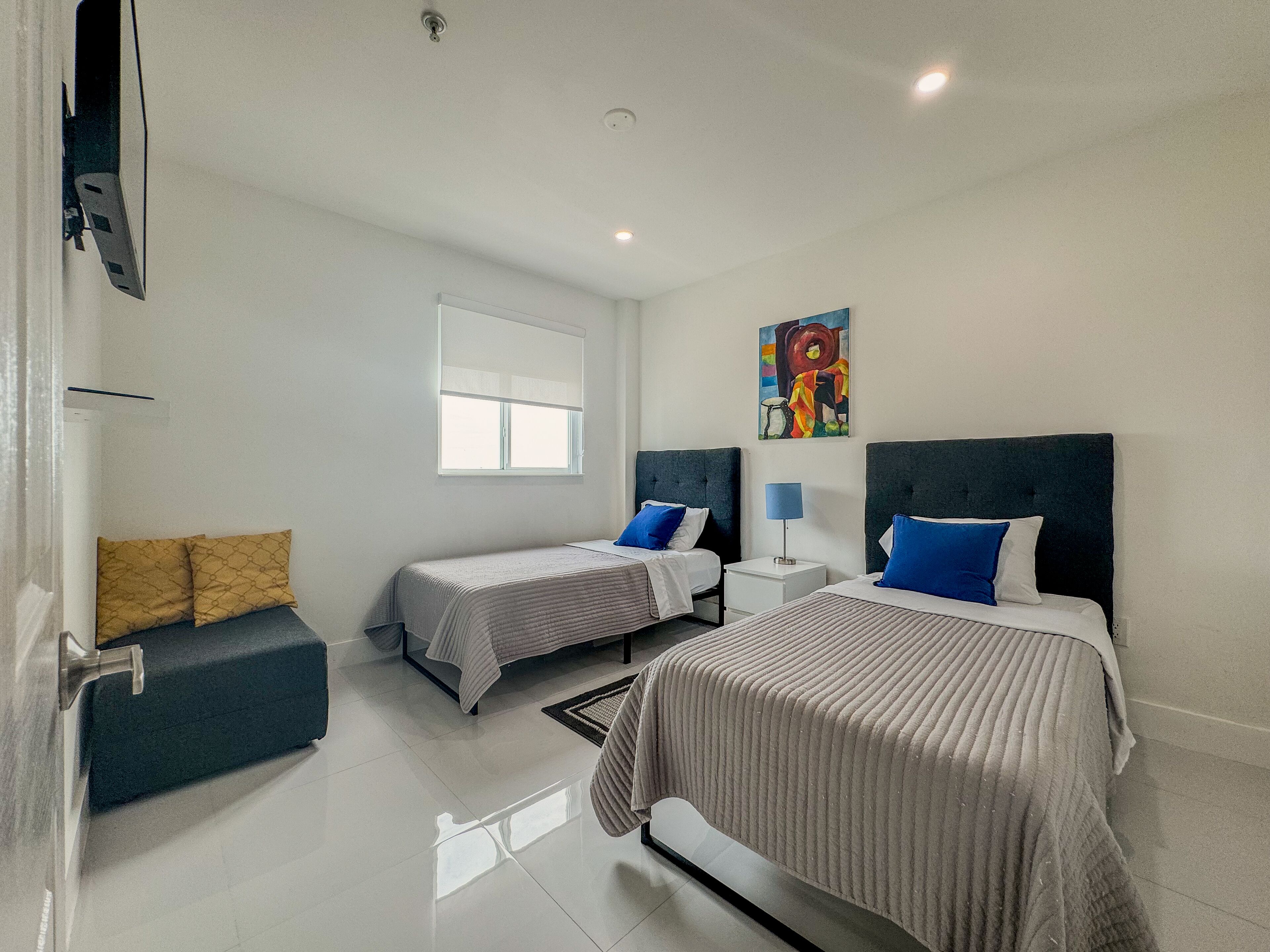 2 bedrooms, desk, iron/ironing board, travel crib