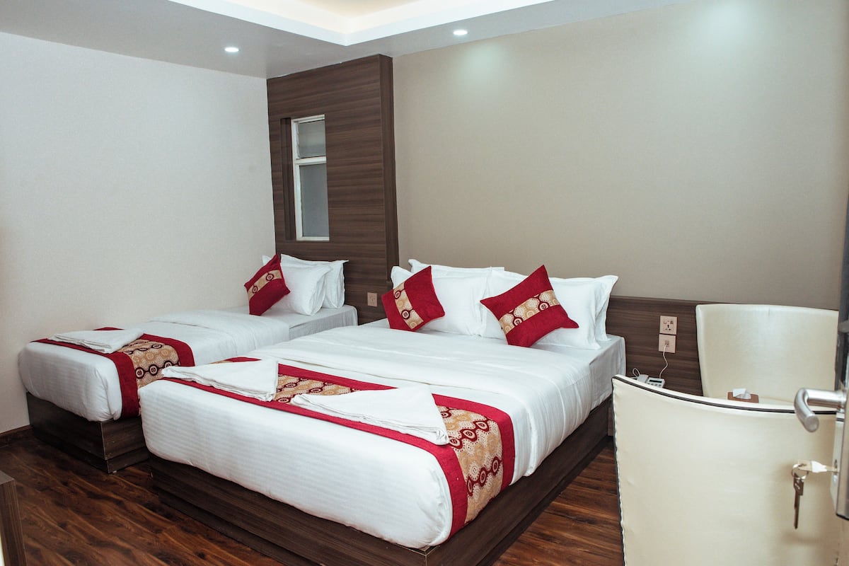 Family Triple Room | Individually decorated, individually furnished, desk, laptop workspace