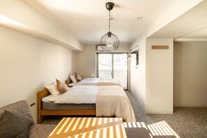 Apartamento família | 1 quarto, edredons de pluma, escrivaninha, ferros/tábuas de passar roupa